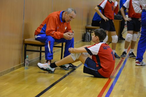 Coach talking to his team.